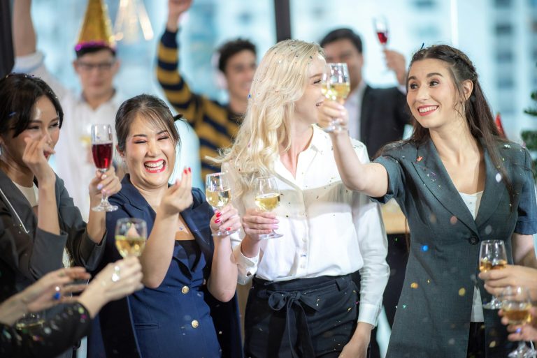 Business partners toast champagne company event celebration success